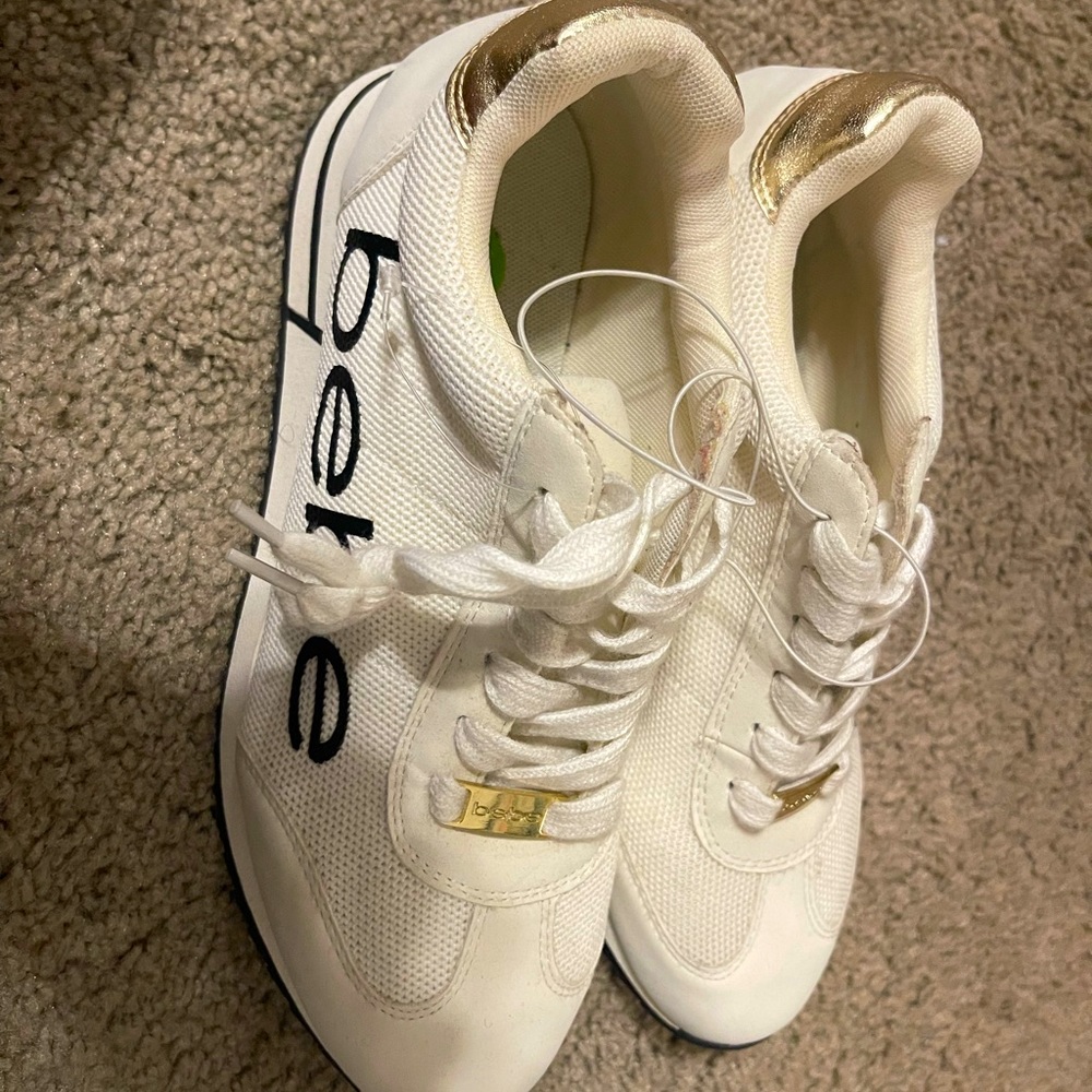 Bebe sneakers  w gold trim with matching yoga pants